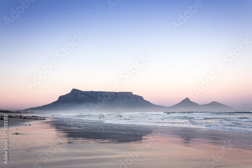 View of Table Mountain at sunrise, Cape Town, South Africa from Milnerton Beach