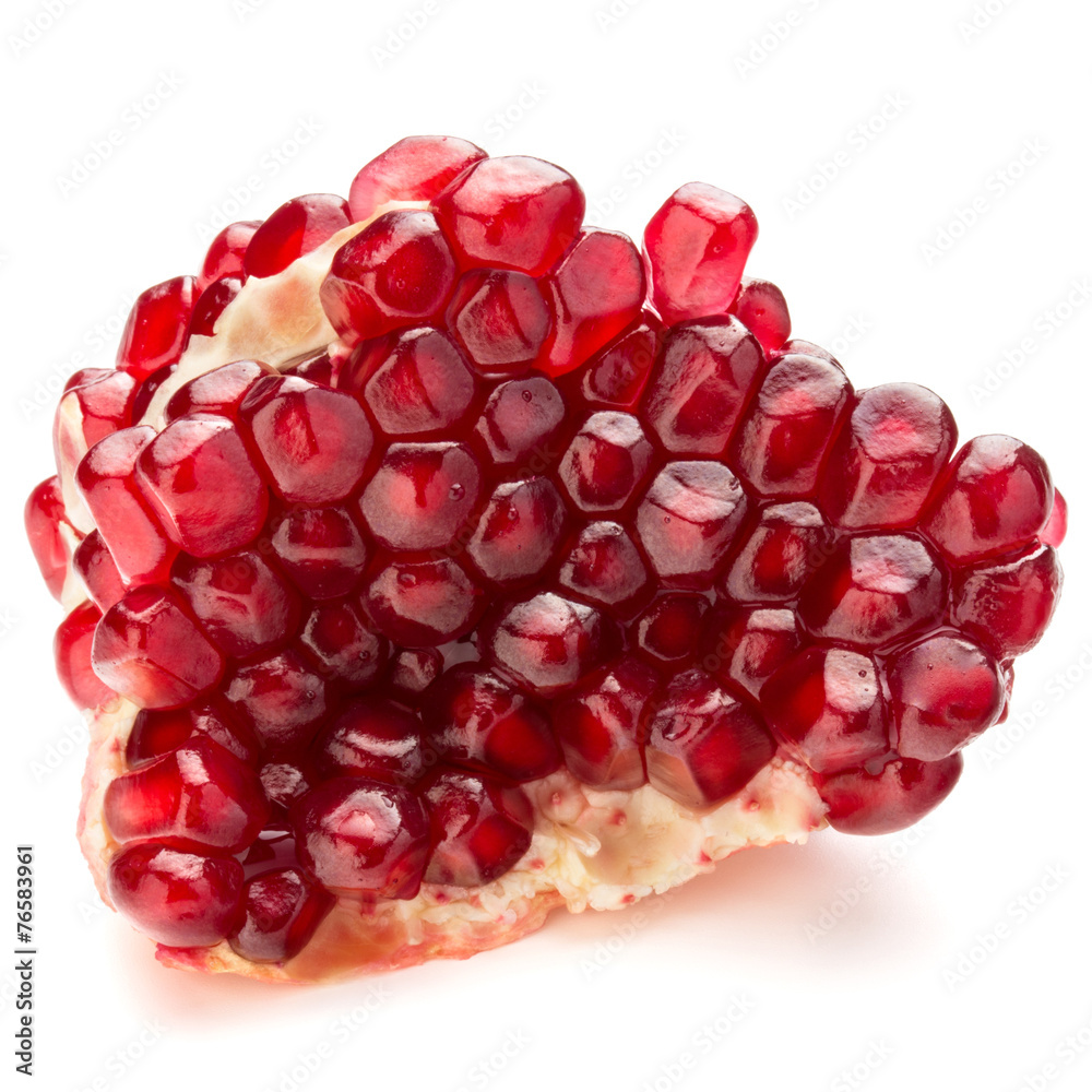 Ripe pomegranate fruit segment isolated on white background cuto Ripe pomegranate fruit segment isolated on white background cuto