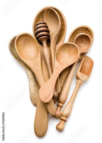 Carving wooden spoon isolated on white background cutout photo