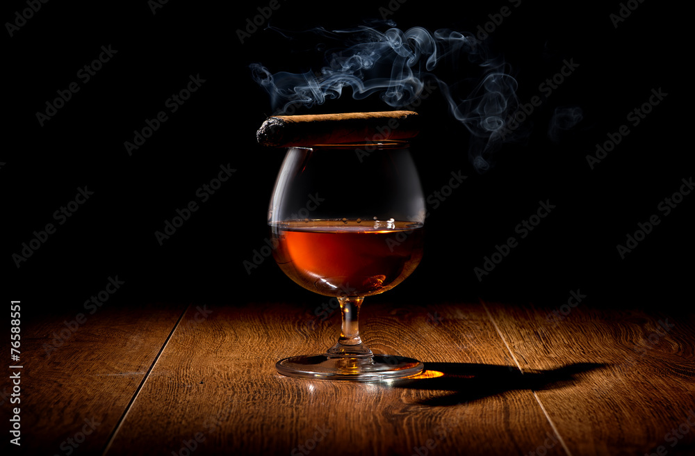 Cigar on wineglass