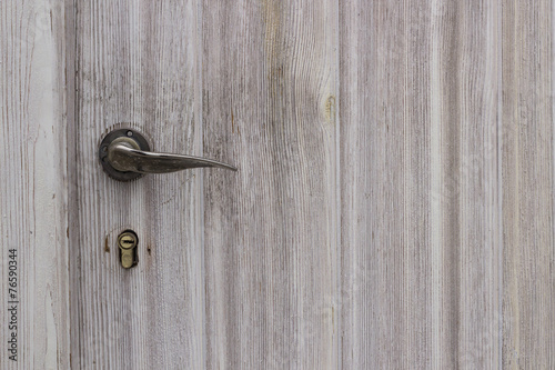 Wallpaper Mural Modern chrome handle on a wooden door Torontodigital.ca
