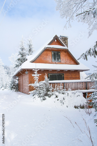 Mountain cottage in winter in the Beskids Mountains, Poland © krysek