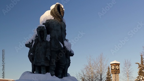 Shadow Moving Across Statue