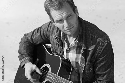 Man with acoustic guitar