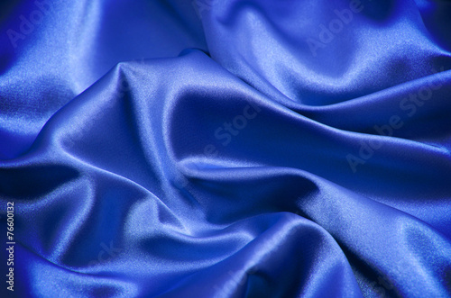 Blue satin fabric close up