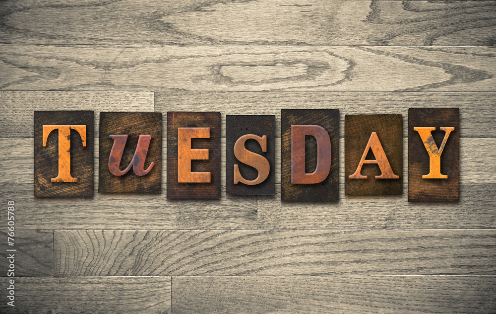 Naklejka premium Tuesday Wooden Letterpress Concept