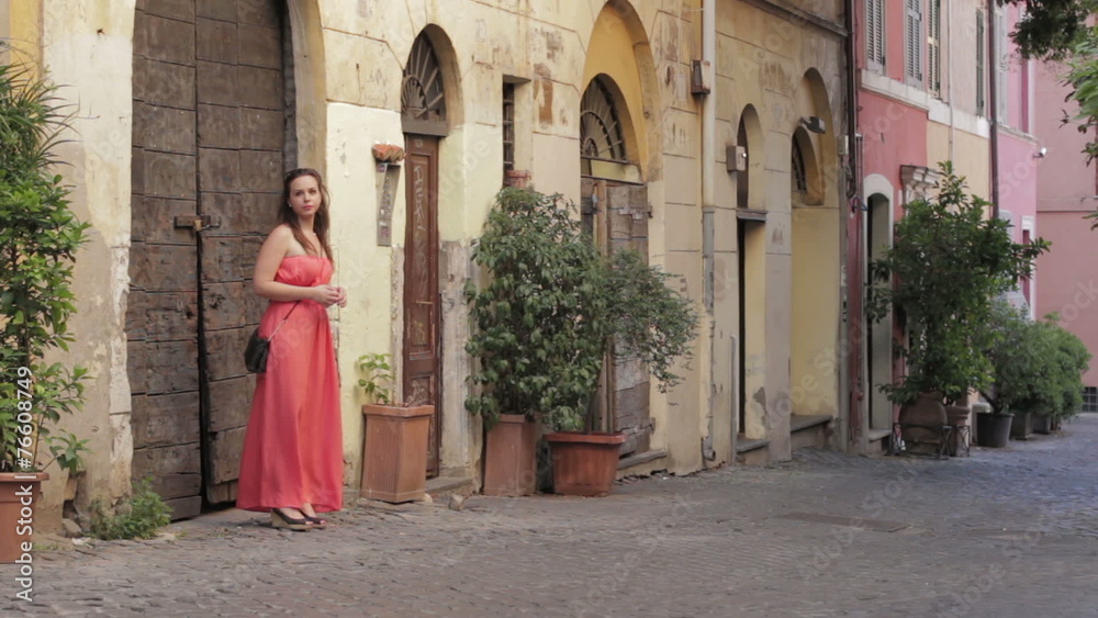 lovers - a young woman waiting for a young man for an appointment lovers - a young woman waiting for a young man for an appointment
