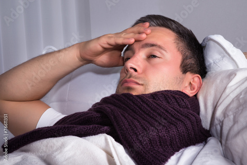 Man Suffering From Cold And Fever