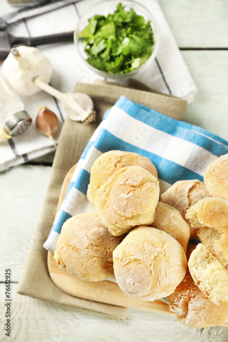 Fresh homemade bread buns from yeast dough with fresh garlic