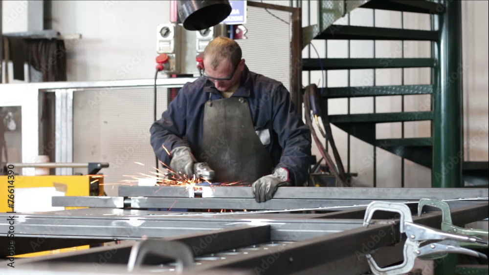 man works with grinder - dolly