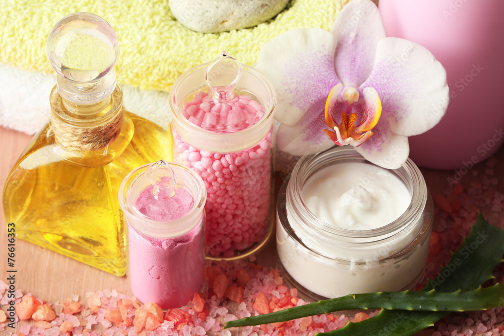 Spa treatments with orchid flower, close-up Spa treatments with orchid flower, close-up