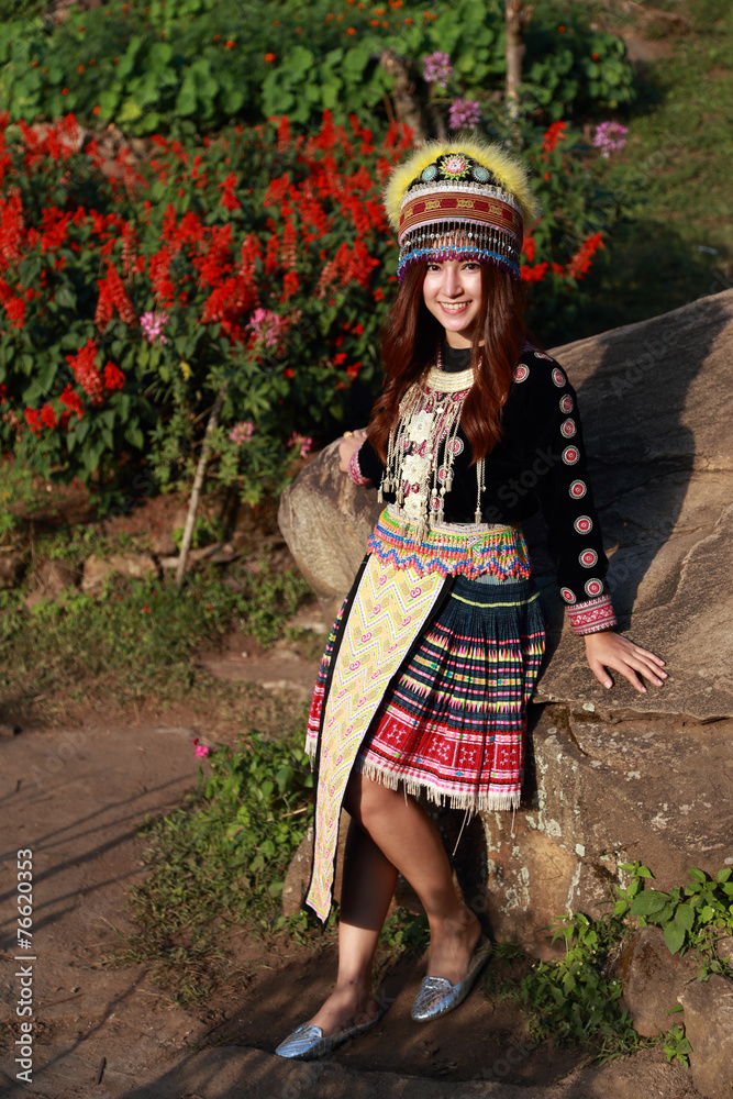 Obraz premium Traditionally dressed Mhong hill tribe woman in the garden
