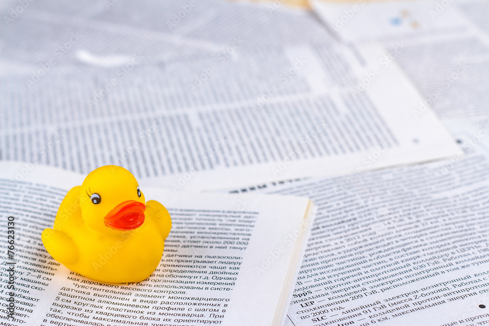 hoax symbol with rubber duck and newspaper Stock Photo | Adobe Stock