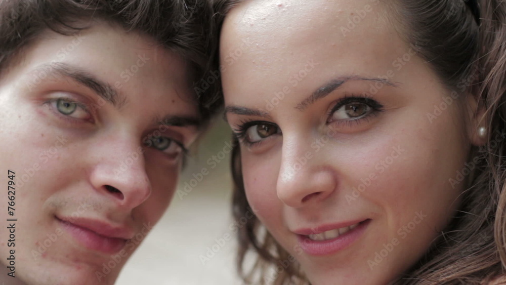 beautiful smiling couple looking at camera beautiful smiling couple looking at camera