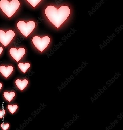 Self-illuminated pink hearts on black background