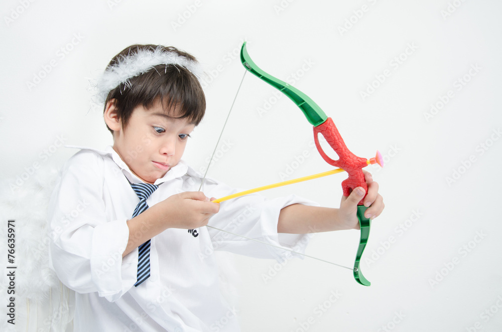 Little boy portrait pretend as cupid with wing Little boy portrait pretend as cupid with wing