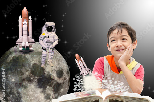 Little boy dreaming  "Elements of this image furnished by NASA"