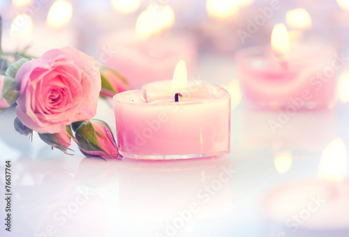 Valentine s Day. Pink heart shaped candles and rose flowers