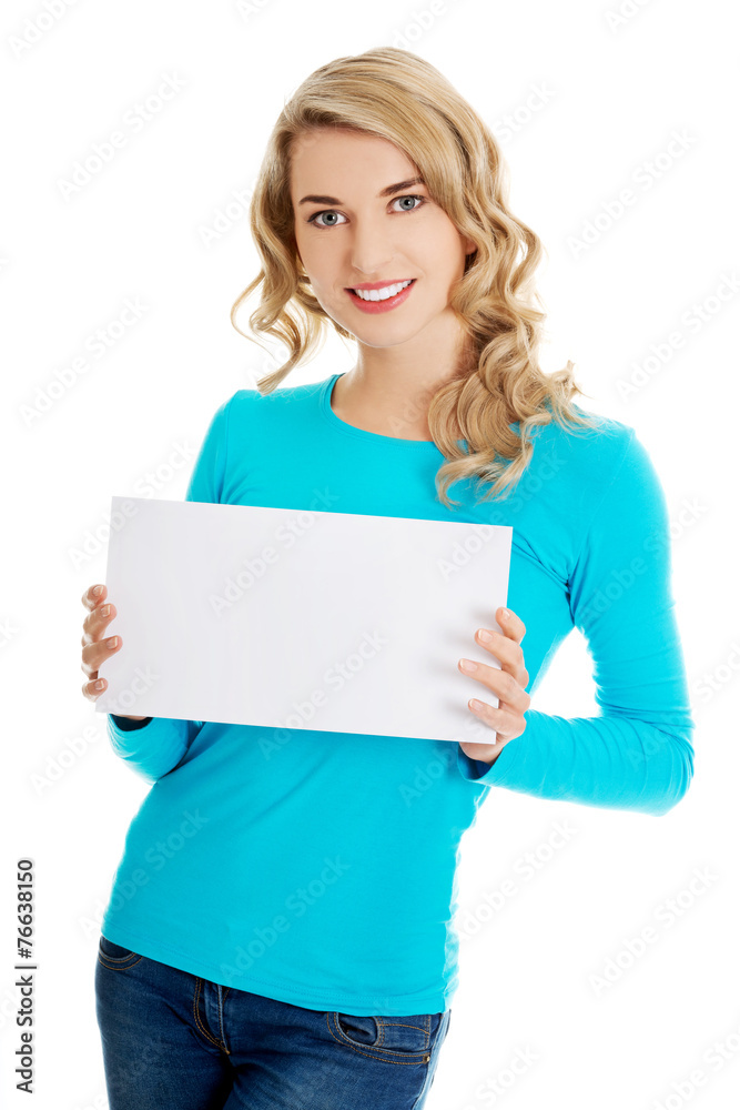 Portrait of happy woman with blank board Portrait of happy woman with blank board