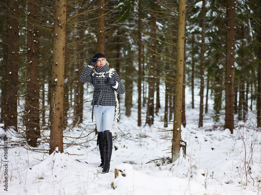 Fashionable woman and winter clothes - rural scene
