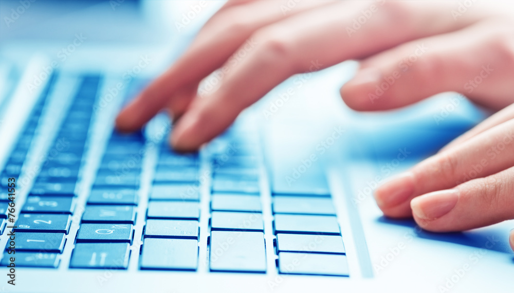 Close-up of typing female hands on keyboard Close-up of typing female hands on keyboard