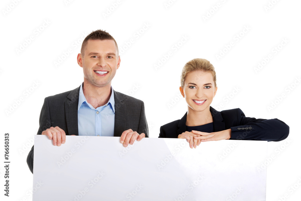 Business team with a banner Business team with a banner
