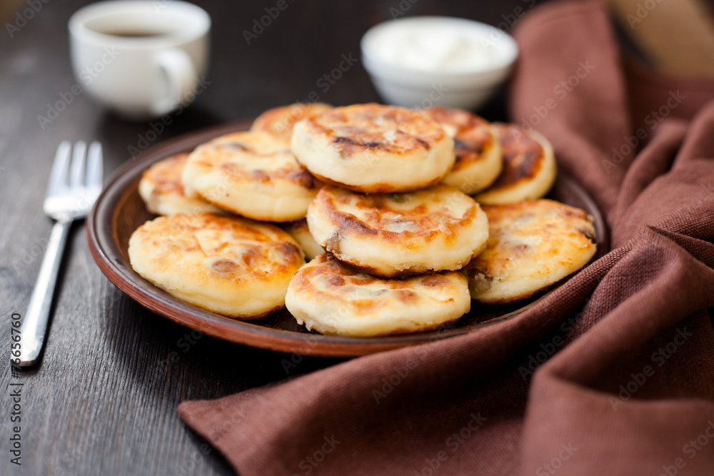 Delicious homemade cheese pancakes with coffee