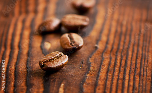 Coffee beans on a old background
