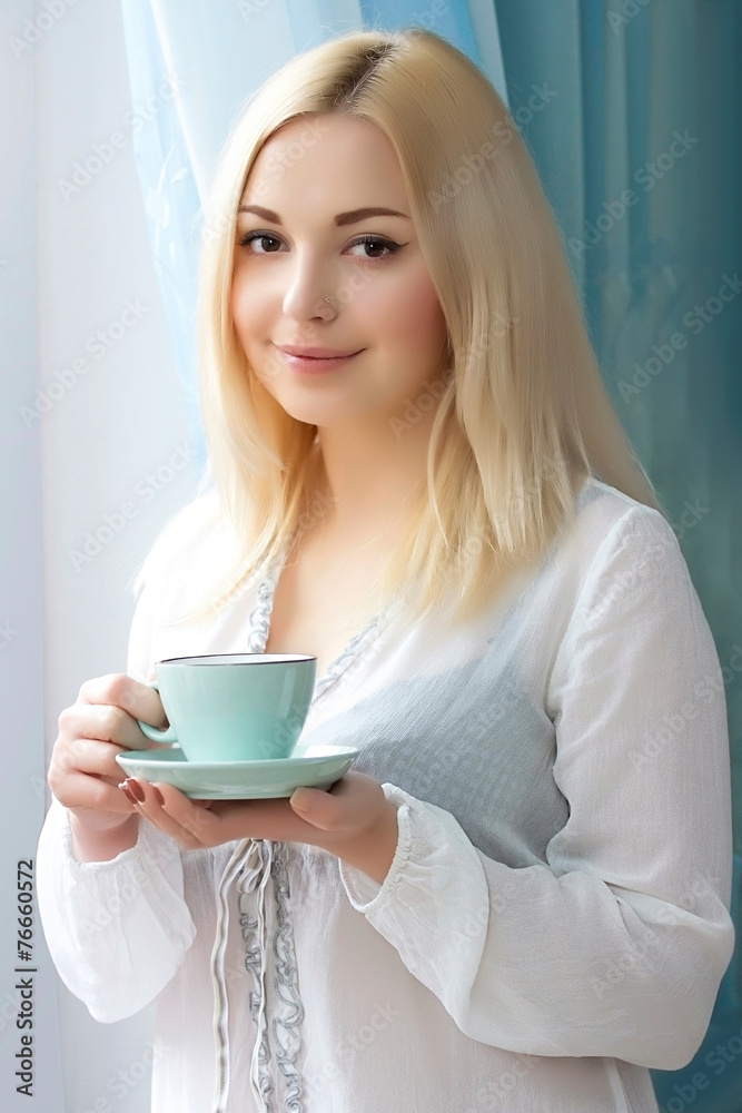 Young woman with a coffee mug. Morning. Young woman with a coffee mug. Morning.