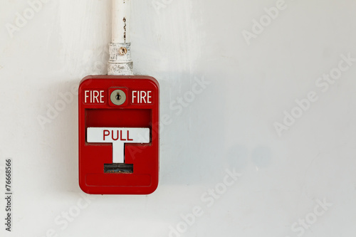 Old red box fire alarm  isolated on white background