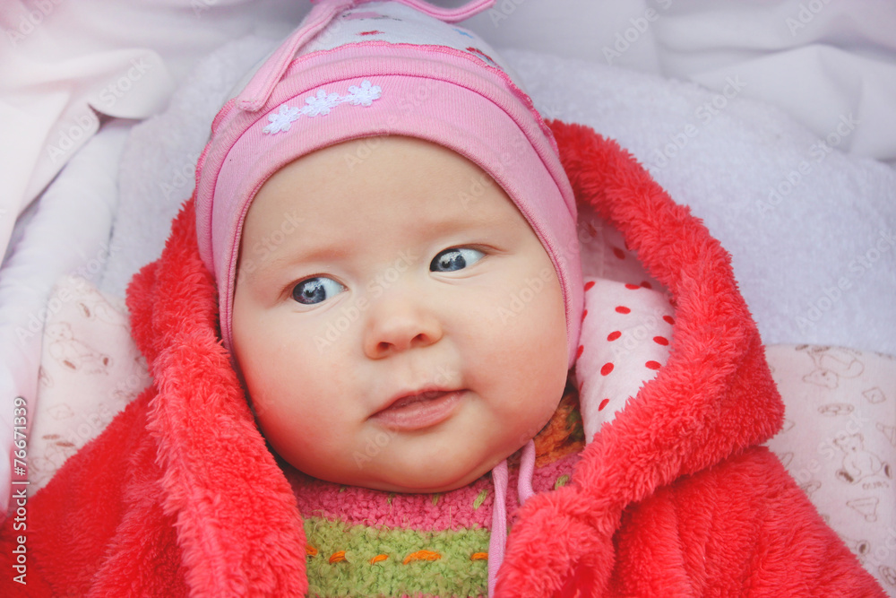 little baby smiling in the perambulator little baby smiling in the perambulator