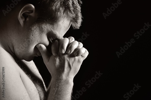 Praying man.