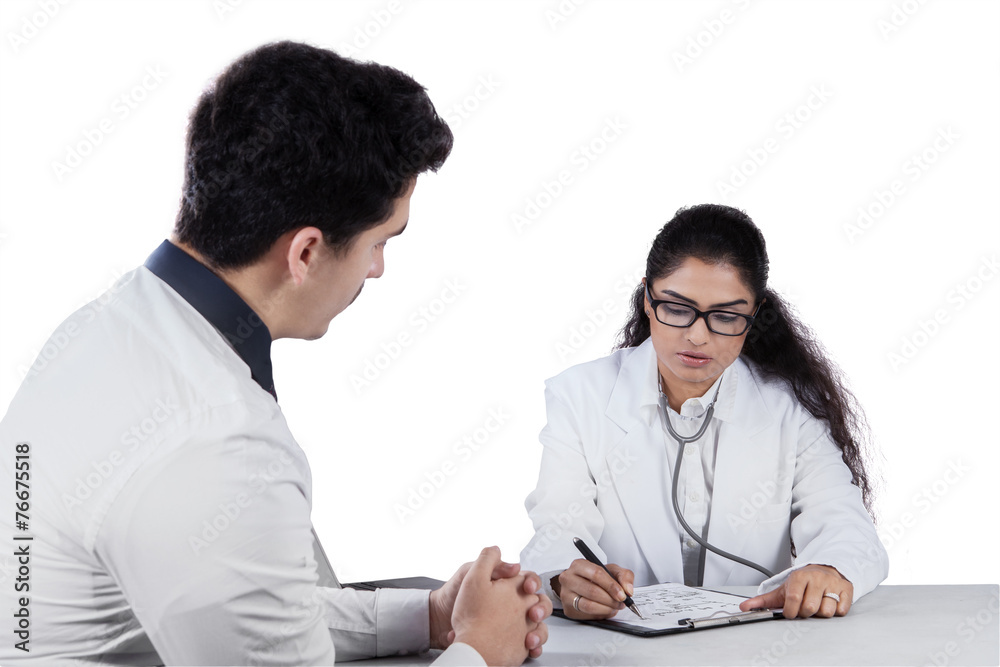 Male patient consulting with personal doctor Male patient consulting with personal doctor