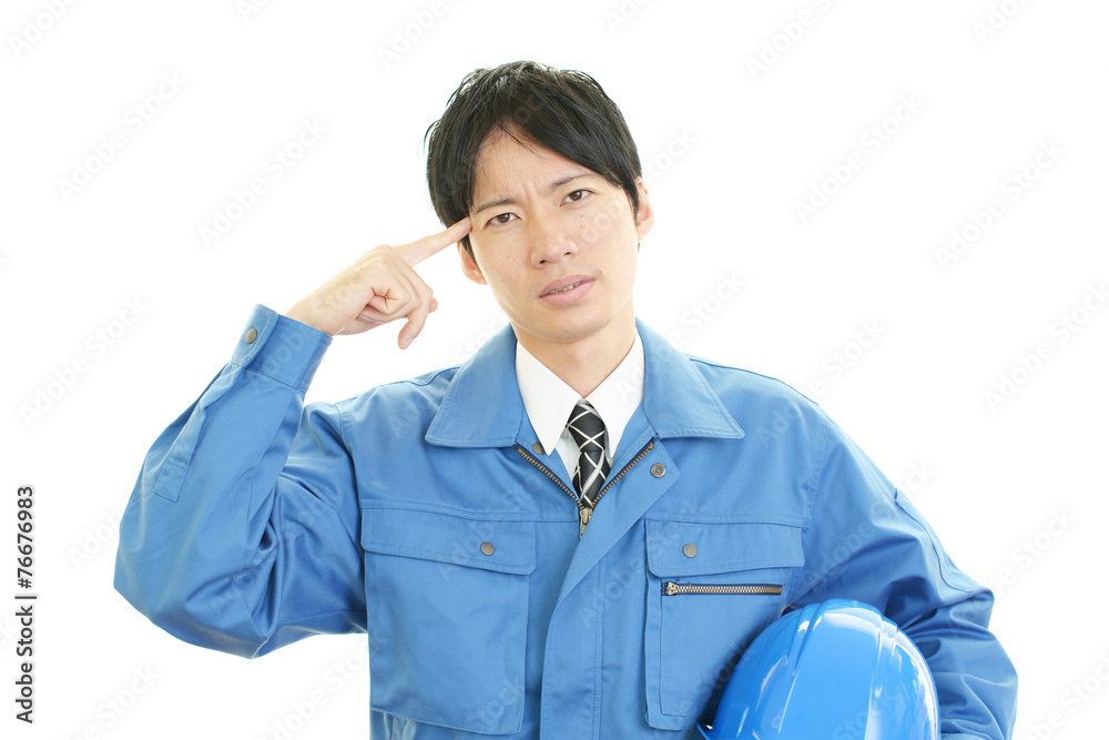 苦悩する労働者