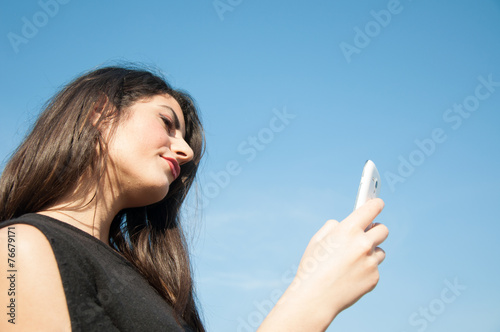 young beautiful girl on the phone