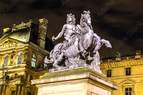 The Louvre at night in Paris