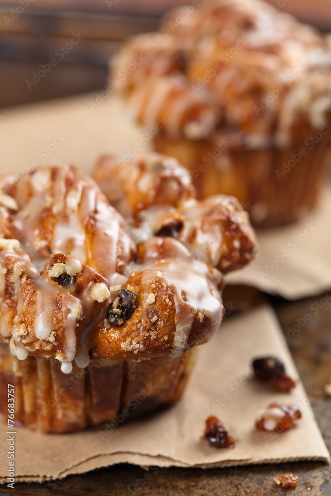 Cinnamon Raisin Muffins - Cobblestone. Selective focus. Cinnamon Raisin Muffins - Cobblestone. Selective focus.