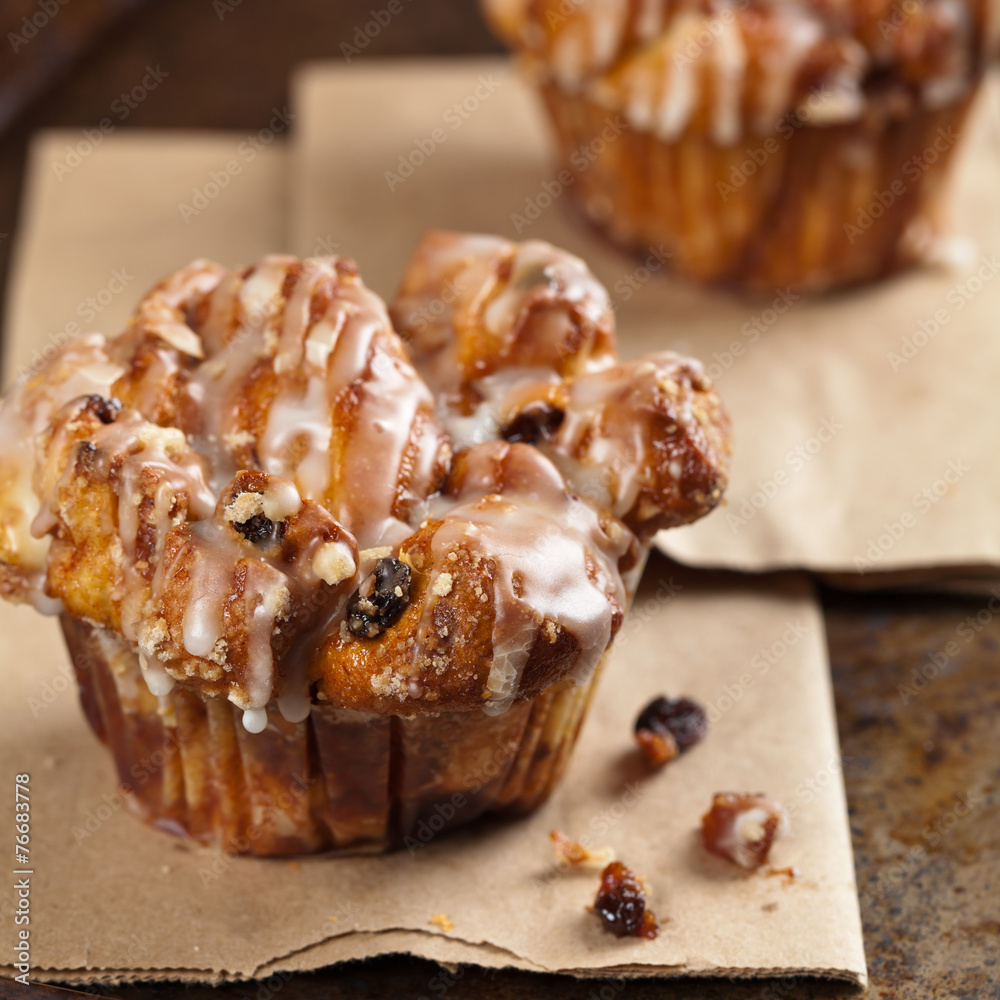Cinnamon Raisin Muffins - Cobblestone. Selective focus. Cinnamon Raisin Muffins - Cobblestone. Selective focus.
