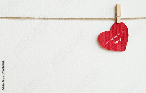 Red fabric heart with happy valentine's day 2015 words