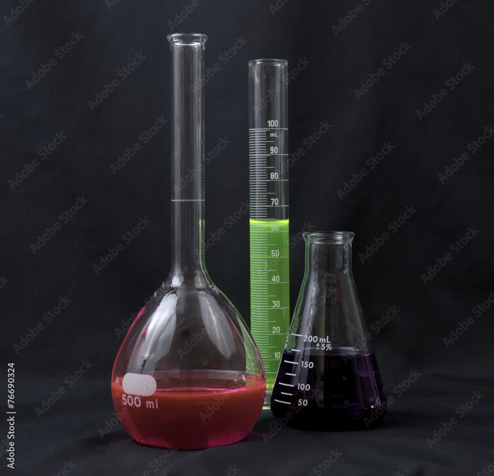Lab glassware with colorful fluids Lab glassware with colorful fluids