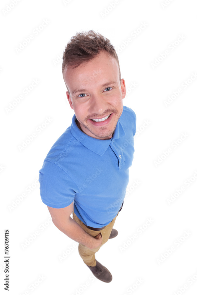 young man looks up at camera young man looks up at camera