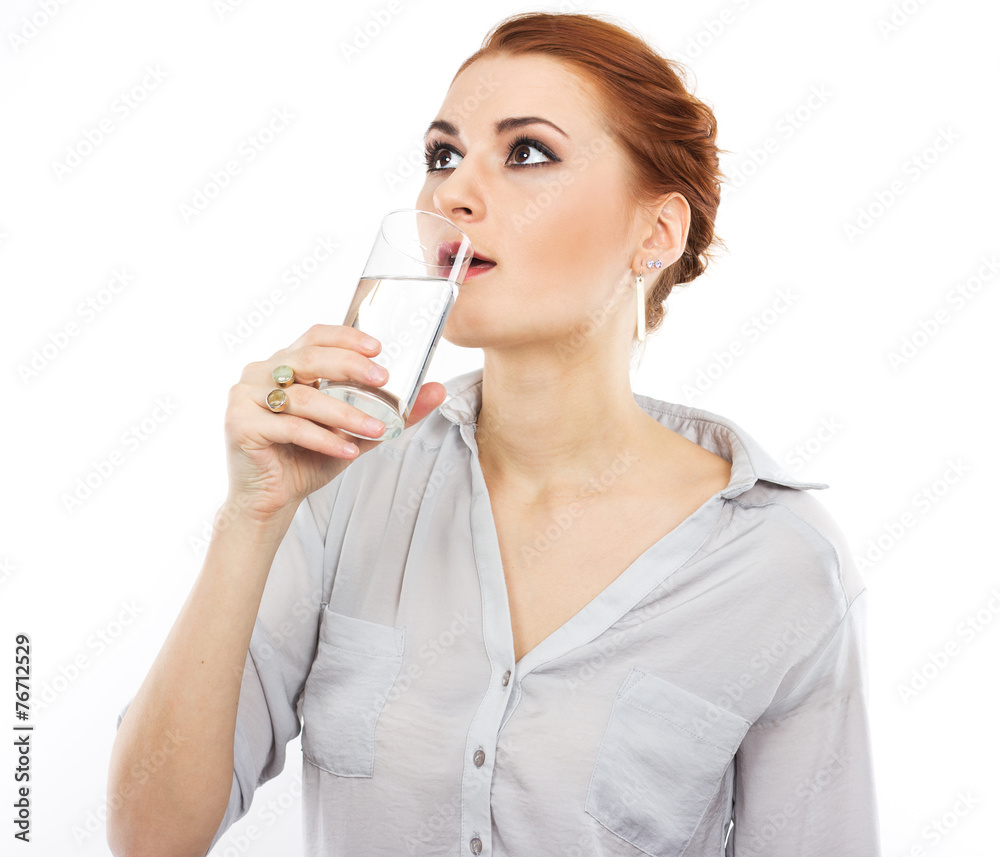 Happy young girl with a glass of water. Happy young girl with a glass of water.