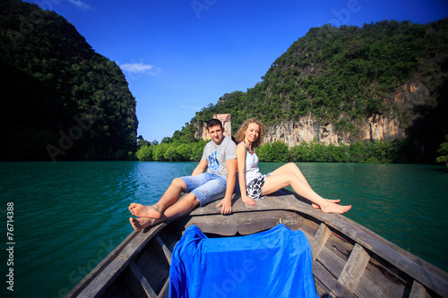 blonde girl and man on boat © alkiona_25