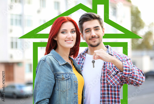 Loving couple in drawing house