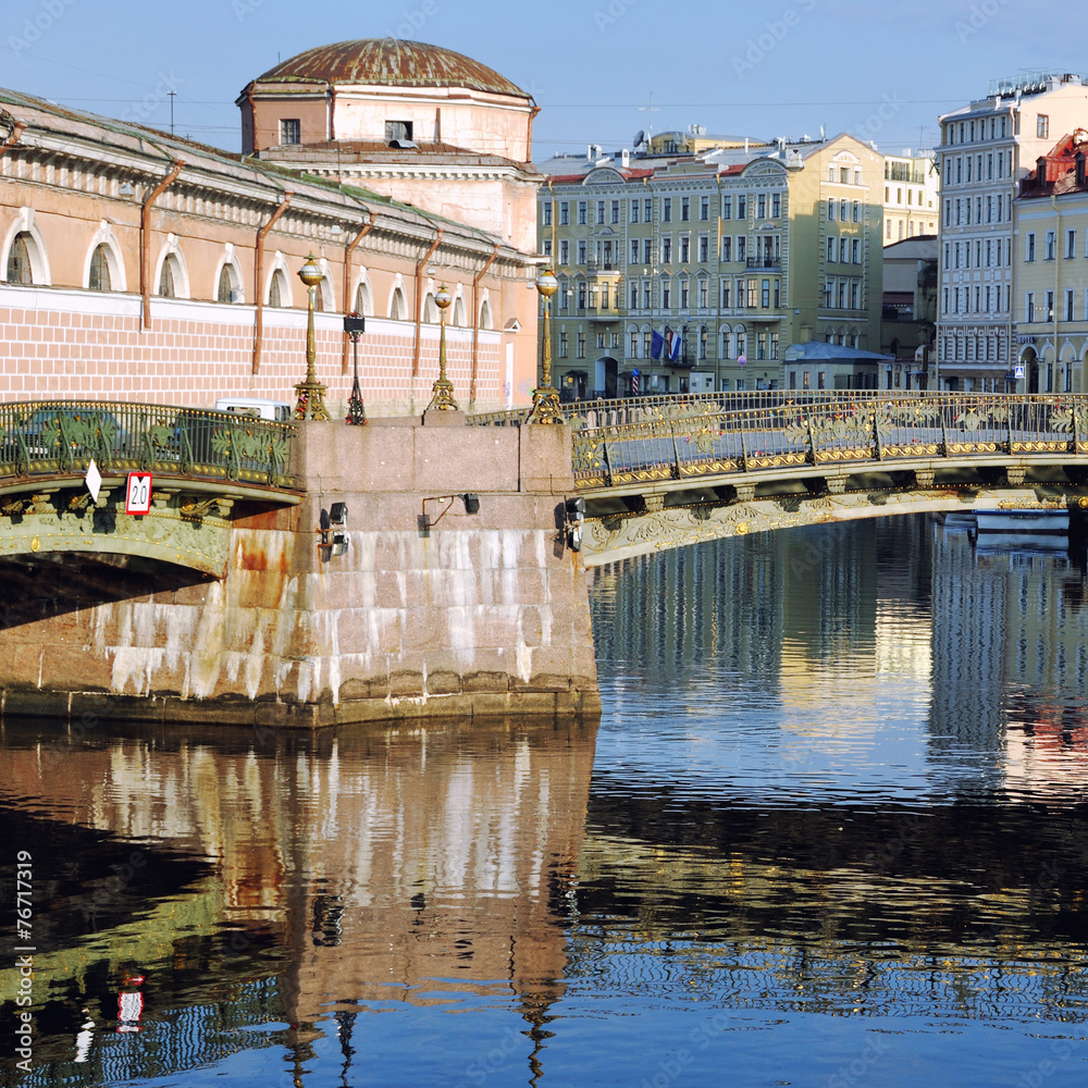 Naklejka premium Old building and Bridge with reflection in Saint Petersburg