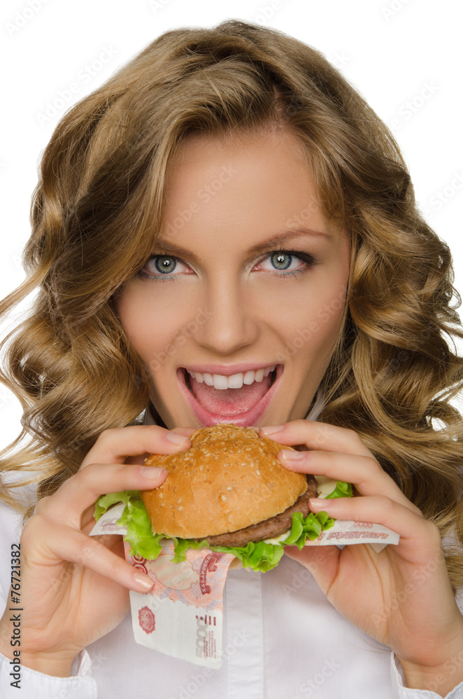 Young woman is going to bite the Burger from RUR Young woman is going to bite the Burger from RUR