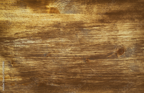 photo of wooden board background with faded effect filter  