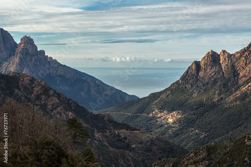 Ota in Corsica with mountains and Mediterranean sea