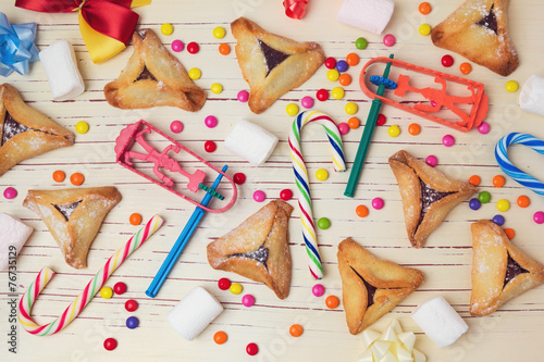 Hamantaschen cookies with candy. View from above