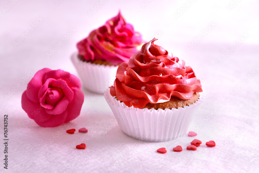 Delicious cupcakes on table close-up Delicious cupcakes on table close-up
